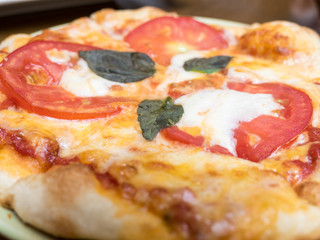 Tomato and cheese pizza closeup