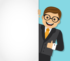 businessman looks out from behind a white background and shows an unfilled hand