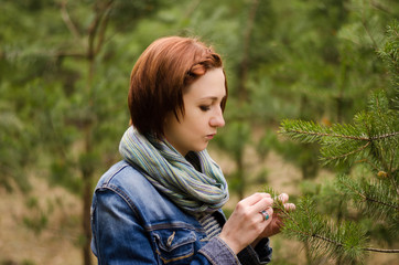 Perfect girl portrait in the spring tree   