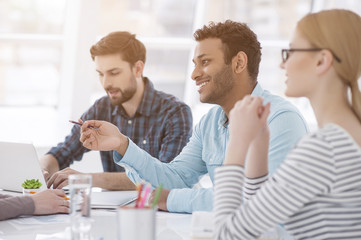 Colleagues at office meeting