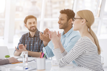 Colleagues at office meeting