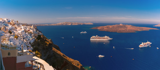Panorama of Fira, modern capital of the Greek Aegean island, Santorini, with orthodox church, cruise ships, caldera and volcano, Greece - obrazy, fototapety, plakaty