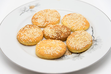 Oval cookies on a white plate