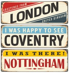 Retro tin sign collection with UK city names