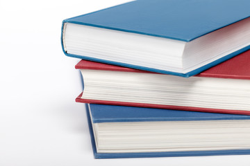 Three books on white background