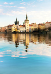 Naklejka na ściany i meble Historical buildings in Prague from across the river