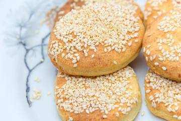 Oval cookies on a white plate