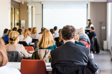 Audience at business conference.