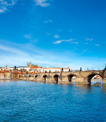 Fototapeta na wymiar Charles Bridge, St. Vitus Cathedral and historical Prague
