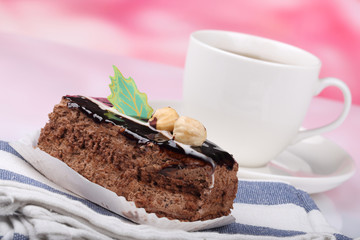 chocolate cake with nuts and tea