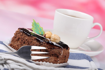 chocolate cake with nuts and tea