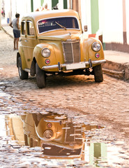 A classic car in the street of Trinidad city in Cuba