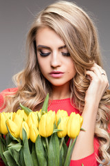 Fototapeta premium Portrait of beautiful girl with flowers.