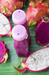 Freshly squeezed juices are sold at a market in Bangkok