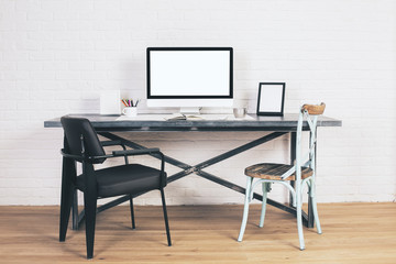 Chairs at designer desk