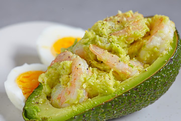 Stuffed avocado with garlic shrimp
