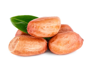 Peanuts with green leaf. Isolated on a white background.