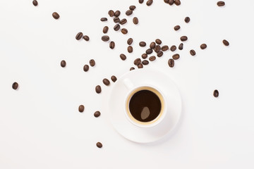 Coffee on surface with beans