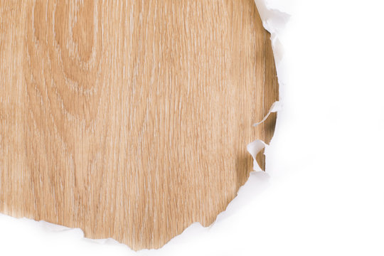 Ripped white paper wooden surface