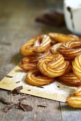 Traditional mexican dessert churros with chocolate sause.