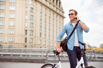 Cheerful man talking on the phone