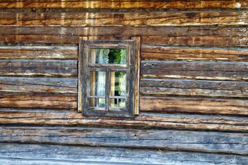 Obraz na płótnie Canvas Old wooden house wall and window