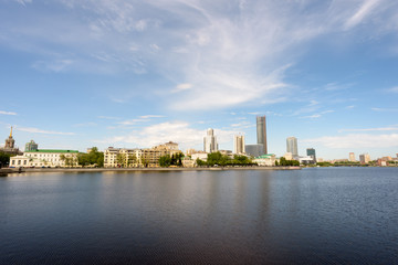 Fototapeta na wymiar City Pond in Yekaterinburg Russia with Business Skyscrapers