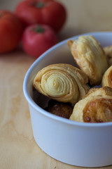 Dry spiral puff pastry as small pizzas