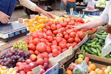 Vegetable Market Stall and People Picking