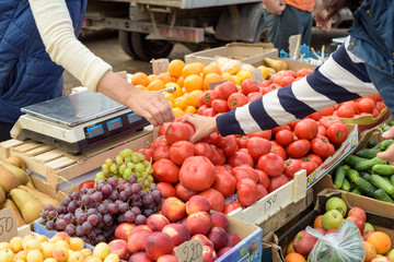 Vegetable Market Stall and People Picking