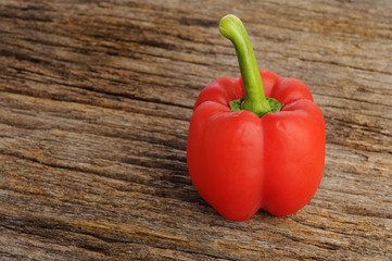 Close-up of Red Bell Pepper On Wooden Background