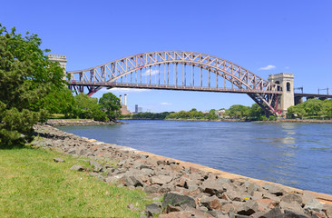 The Hell Gate Bridge (East River Arch Bridge) in New York City is a railroad only bridge, not used for passenger cars, and was a model for the Sydney Harbour Bridge in Australia