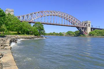 The Hell Gate Bridge (East River Arch Bridge) in New York City is a railroad only bridge, not used for passenger cars, and was a model for the Sydney Harbour Bridge in Australia