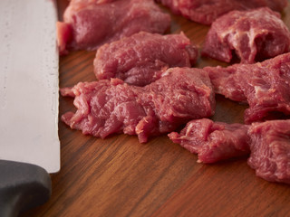 piece of meat and a knife