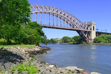 The Hell Gate Bridge (East River Arch Bridge) in New York City is a railroad only bridge, not used for passenger cars, and was a model for the Sydney Harbour Bridge in Australia