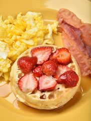 Waffles with bacon and eggs