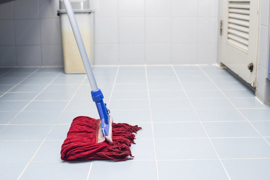 Toilet Floor Cleaning With Red Mob