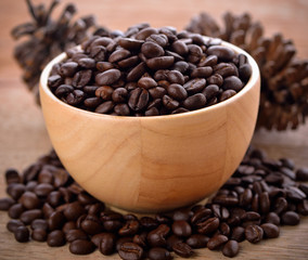  coffee beans on wooden background
