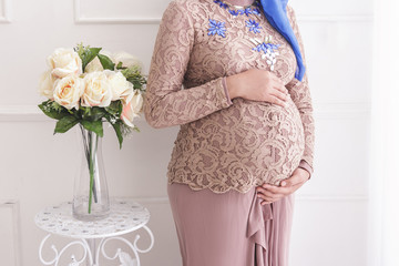 close up portrait of a pregnant stomach