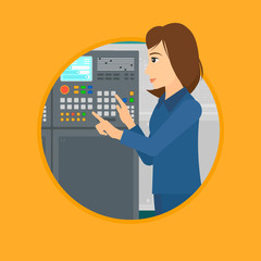 Engineer standing near control panel.