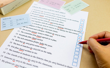 Fototapeta premium check mark box next to english exercise
