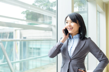 Businesswoman talk to mobile phone