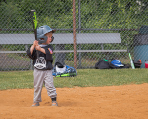 Child Playing Baseball