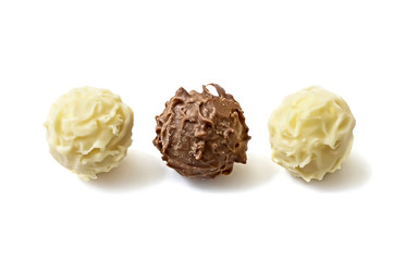 White and dark chocolate candies. Isolated.