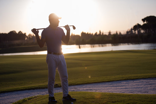 golfer  portrait at golf course on sunset