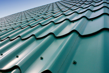 roof tile pattern, close up. Over blue sky part