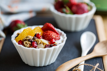 Granola with Orange,Strawberry on yogurt