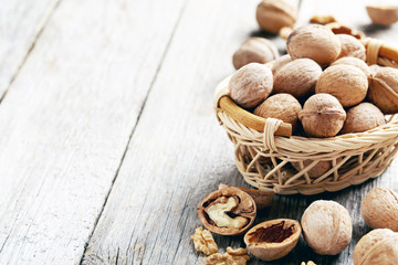 Walnuts on a grey wooden table