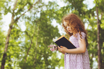 Retro portrait cute child in country style.
