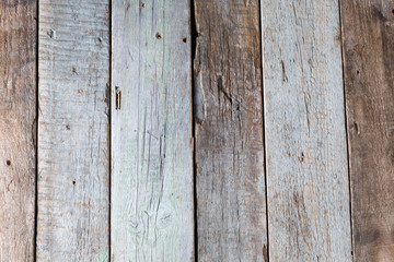 Wooden background from old raw boards 